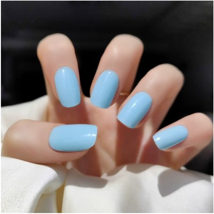 Applied pastel blue gel wraps with a glossy finish, adding a touch of tranquility and elegance to any look.