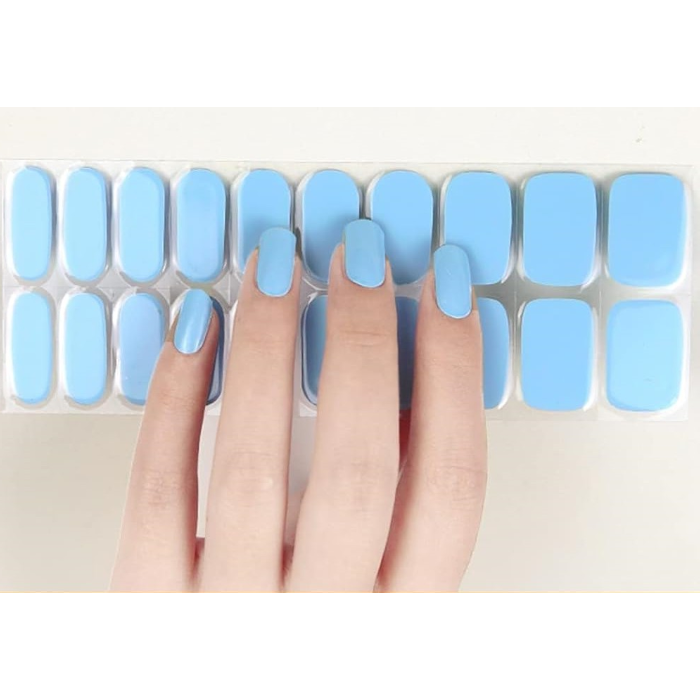 Sticker sheet of pastel blue Daydream semi-cured gel wraps, featuring various sizes for a perfect and damage-free application.