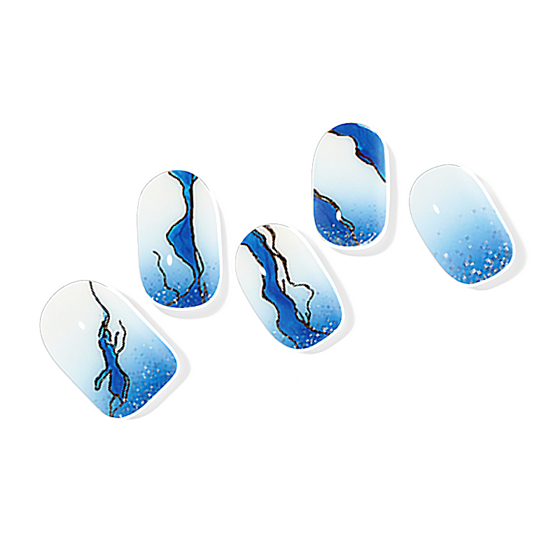 Deep ocean blue semi-cured gel nail wraps with a glossy finish, capturing the essence of ocean waves.