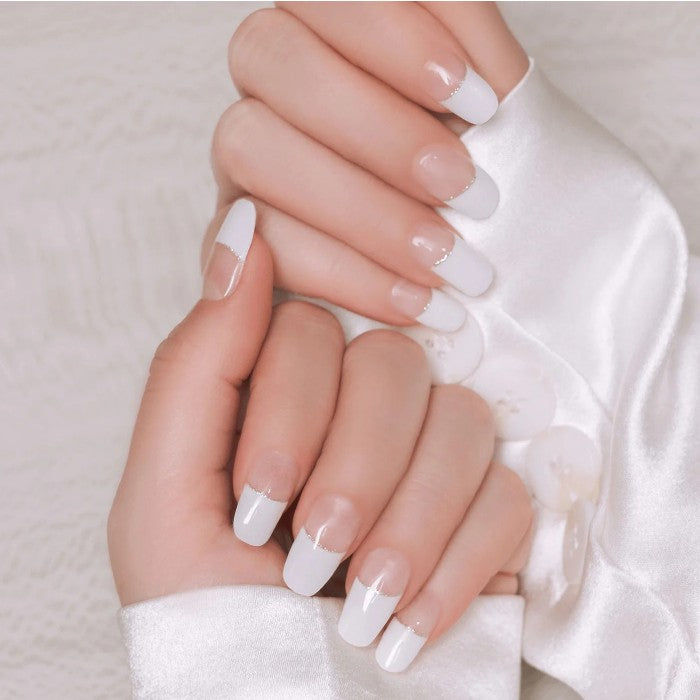 Nails showcasing French Tip wraps, delivering a timeless French manicure.