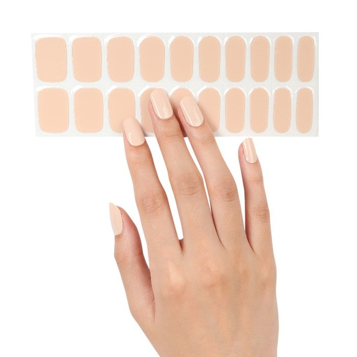 Sticker Sheet: Sticker sheet of soft peachy nude semi-cured gel wraps, featuring various sizes for a customizable and seamless application.