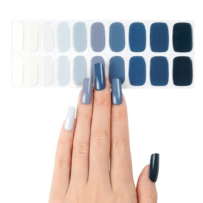 Sticker sheet of turquoise blue semi-cured gel wraps, featuring multiple sizes for a personalized and easy application.