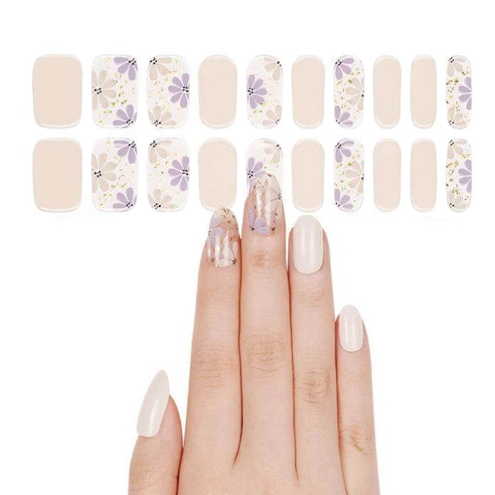 Sticker sheet of Iris gel nail wraps in multiple sizes for a tailored fit.