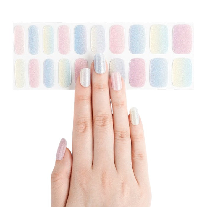 Sticker sheet showcasing gradient pastel gel nail wraps in various sizes.