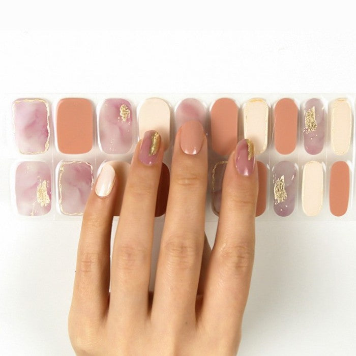 Sticker sheet presenting classic nude gel nail wraps in assorted sizes for a perfect fit.