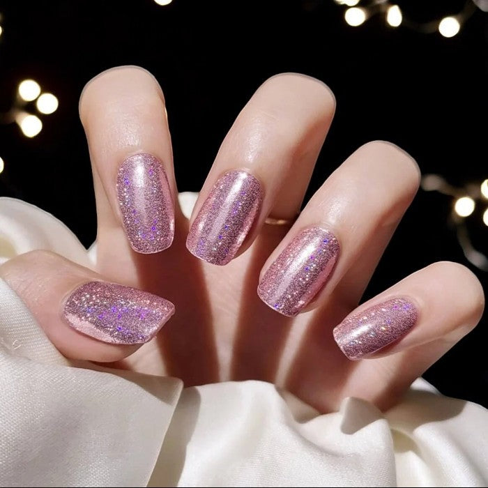 Nails featuring Morning Glory wraps, presenting a serene light blue manicure.