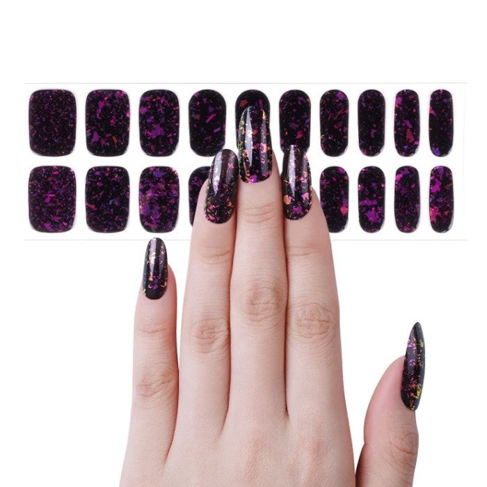 Sticker sheet showcasing purple to blue gradient gel nail wraps in various sizes.