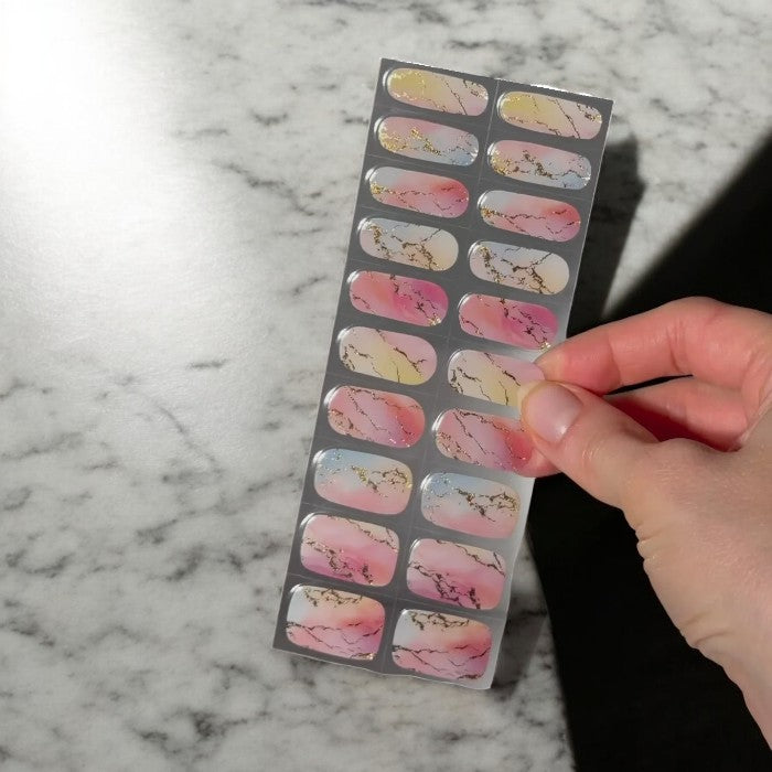 Sticker sheet displaying Whimsical gel wraps in various sizes.