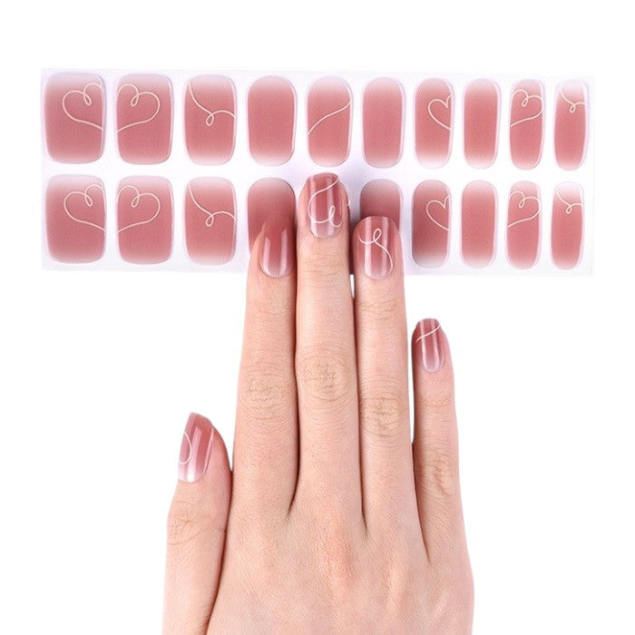 Sticker sheet featuring Blushing Sweetheart gel nail wraps in various sizes for a customized fit.