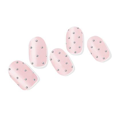 Soft pastel pink semi-cured gel nail wraps with a subtle iridescent shimmer, evoking a whimsical fairytale charm.