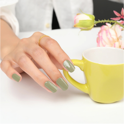 Applied muted olive green gel wraps with a glossy finish, showcasing a chic and understated manicure.