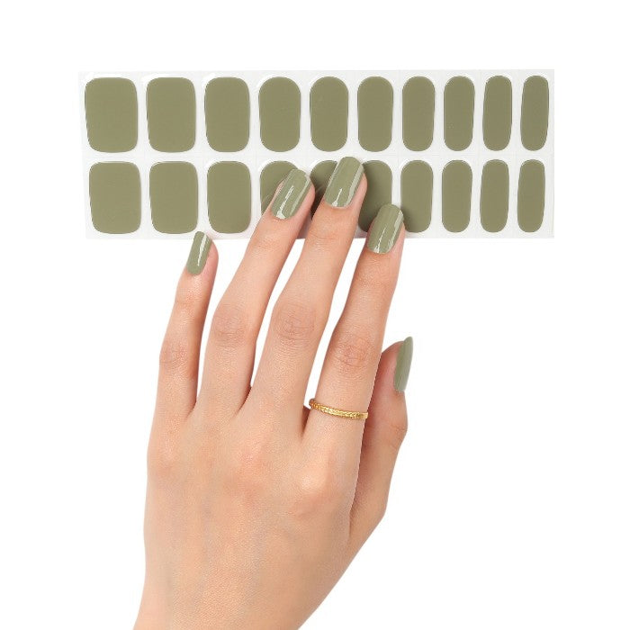 Sticker sheet of muted olive green semi-cured gel wraps, featuring various sizes for a customizable fit.